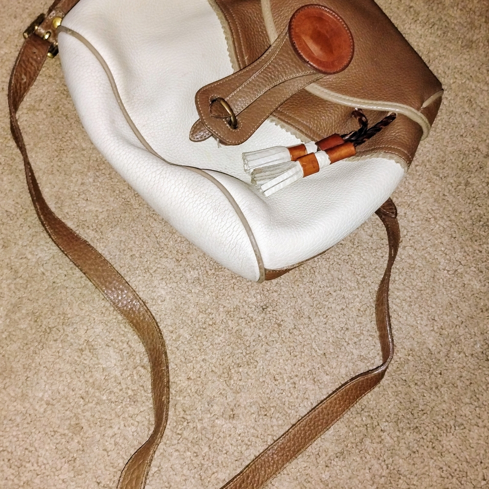 Dooney & Bourke White and Brown Pebbled Leather Shoulder Bag with Tassel Accent